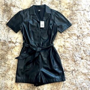 Black leather romper for sale. Brand new. Bought online at Paige.